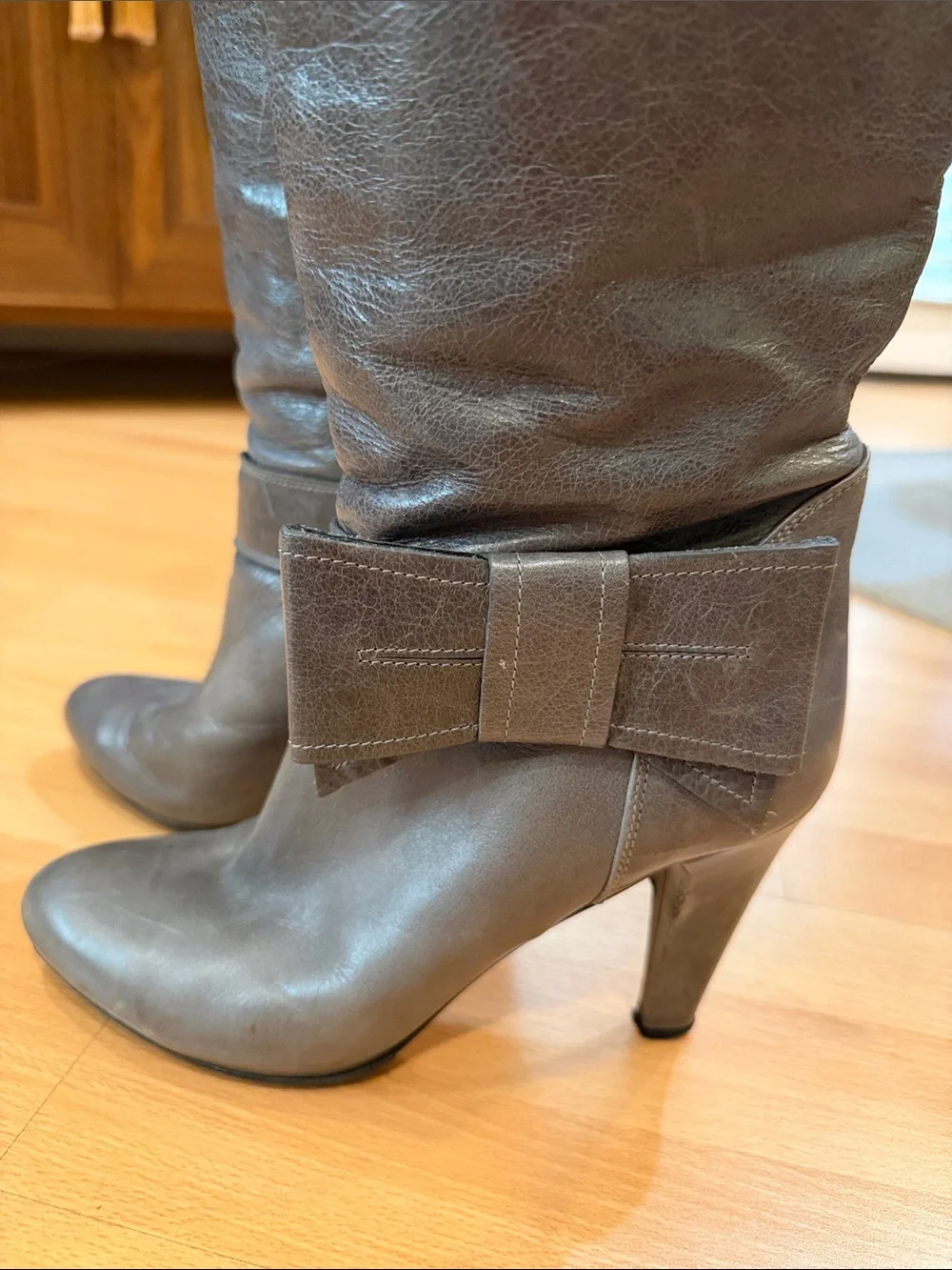 Valentino red Women's heel Tall Bow Accent Boots in grey. Used